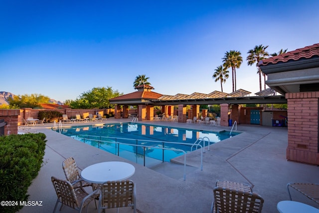 view of pool featuring a patio area and a gazebo