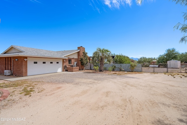 exterior space with a garage