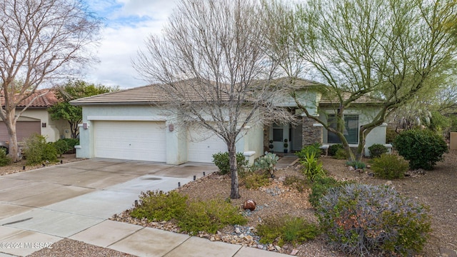 view of front of property featuring a garage