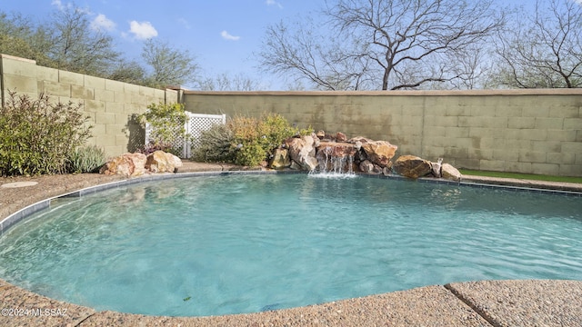 view of pool featuring pool water feature