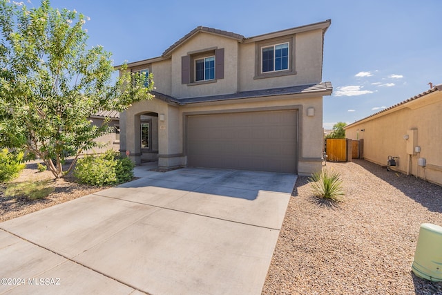 view of front of home with a garage