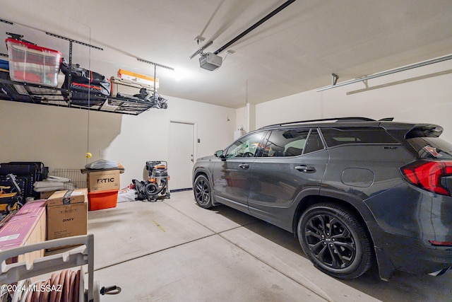 garage featuring a garage door opener