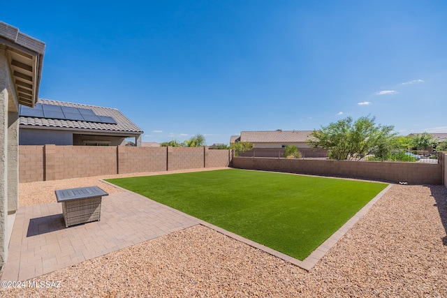 view of yard with a patio area