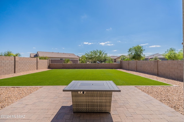 view of patio featuring a fire pit