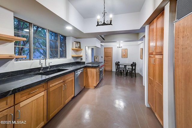 kitchen with dark stone counters, sink, an inviting chandelier, dishwasher, and hanging light fixtures