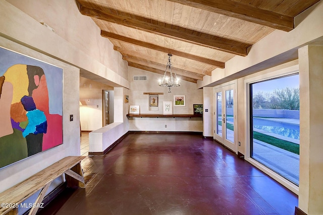 interior space featuring lofted ceiling with beams, a notable chandelier, and wood ceiling