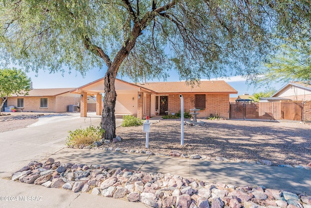 ranch-style house with central AC