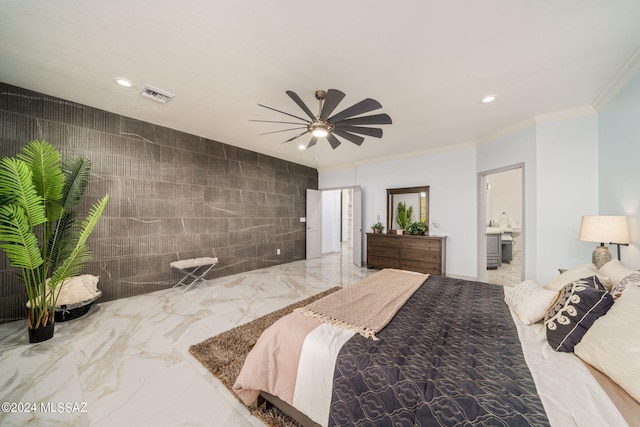 bedroom with ornamental molding, tile walls, ceiling fan, and ensuite bathroom