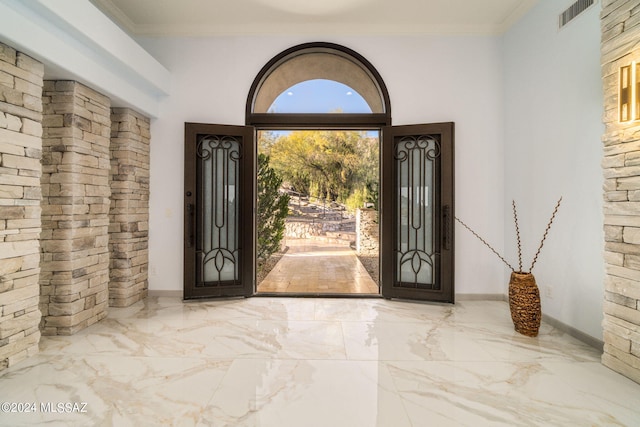 foyer entrance with crown molding