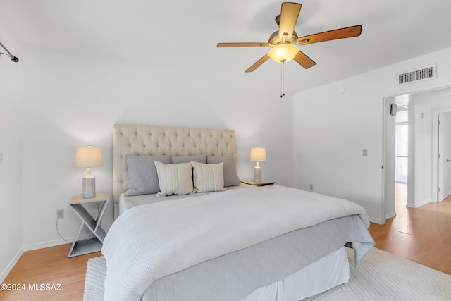 bedroom featuring ceiling fan and light wood-type flooring