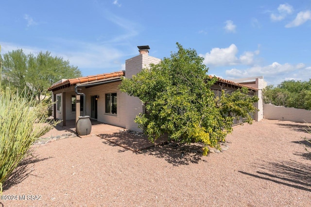 rear view of house featuring a patio area