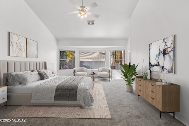 bedroom with ceiling fan, high vaulted ceiling, and light carpet