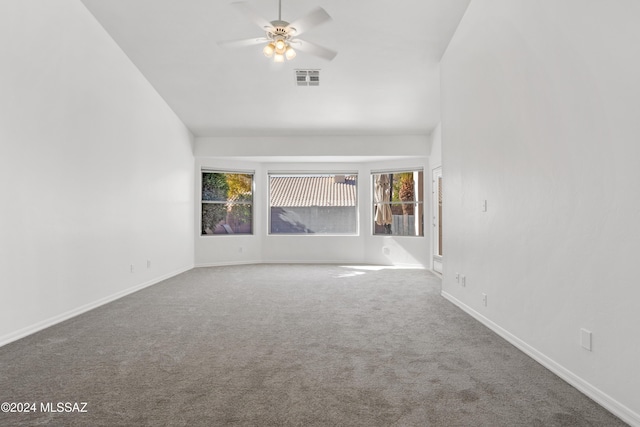 unfurnished living room with carpet floors and ceiling fan