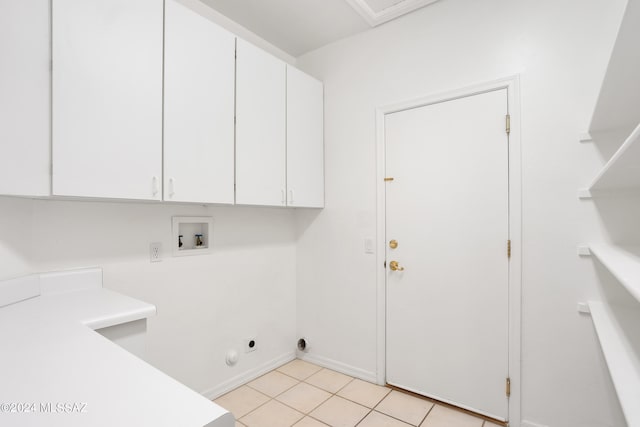 washroom featuring cabinets, washer hookup, hookup for an electric dryer, and light tile patterned floors