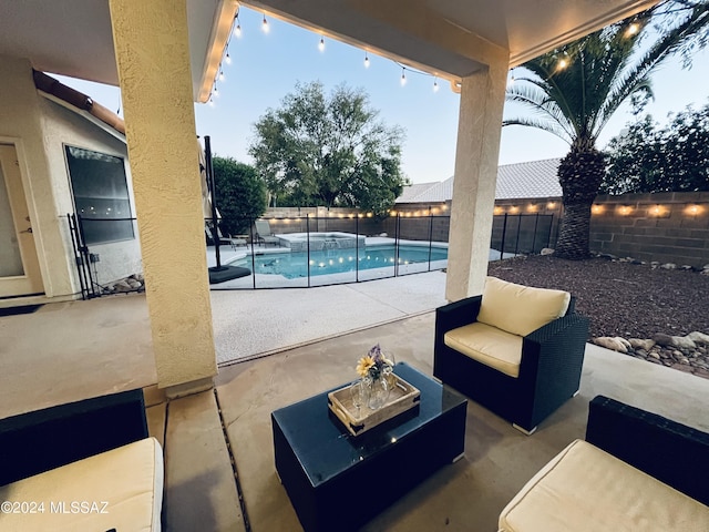 view of patio with a fenced in pool