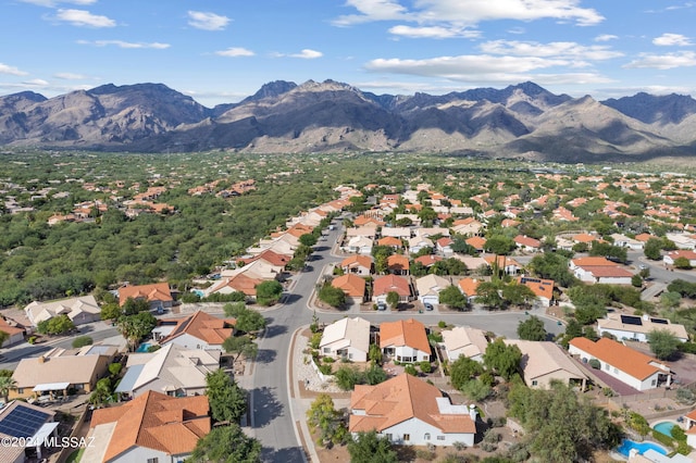 drone / aerial view featuring a mountain view