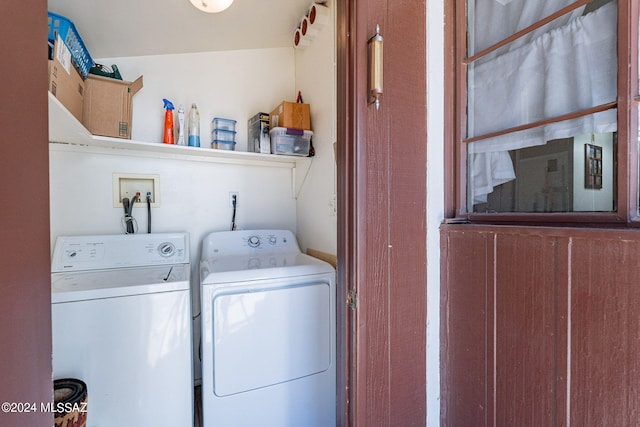 washroom featuring washer and dryer