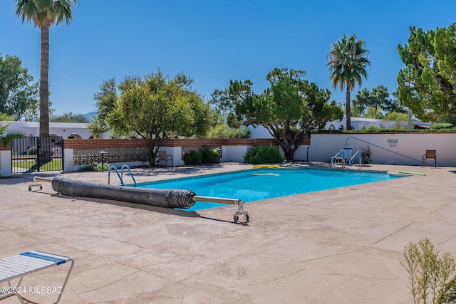 view of pool featuring a patio