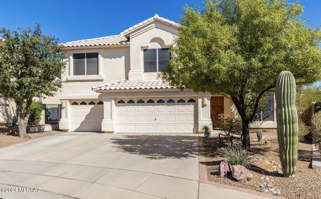 view of front of property featuring a garage