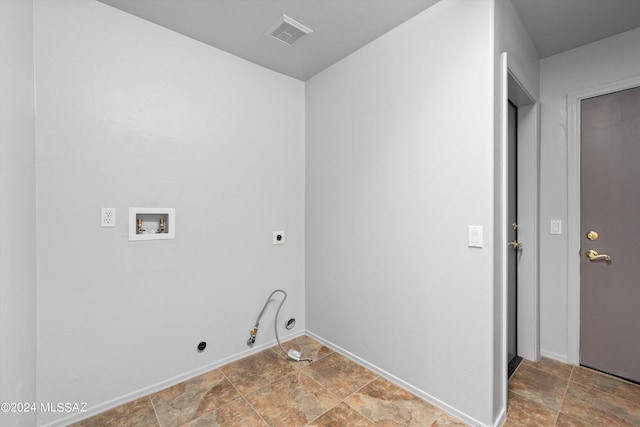 clothes washing area featuring hookup for an electric dryer, hookup for a gas dryer, and hookup for a washing machine