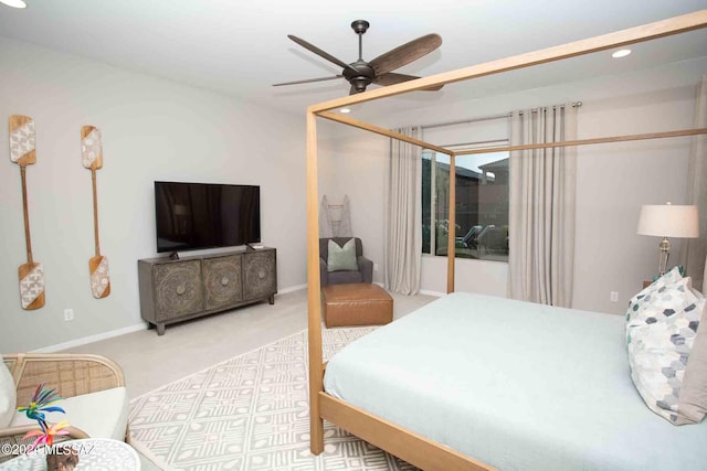 carpeted bedroom with a ceiling fan, baseboards, and recessed lighting