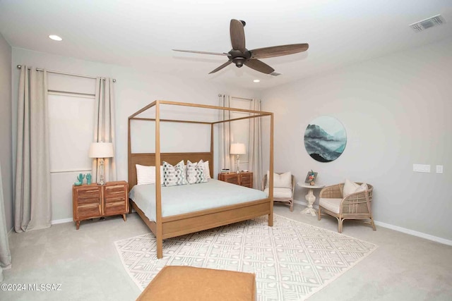 bedroom with visible vents, carpet flooring, and baseboards