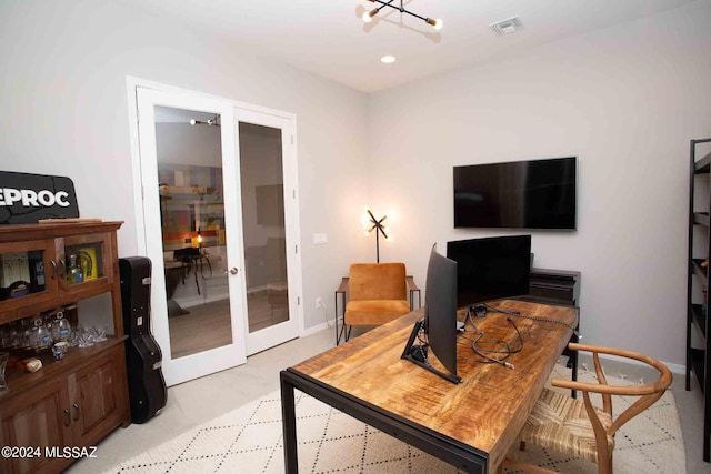 office with an inviting chandelier, french doors, light colored carpet, baseboards, and visible vents