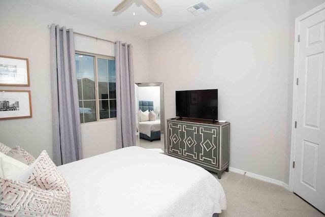 carpeted bedroom featuring baseboards, a ceiling fan, visible vents, and recessed lighting