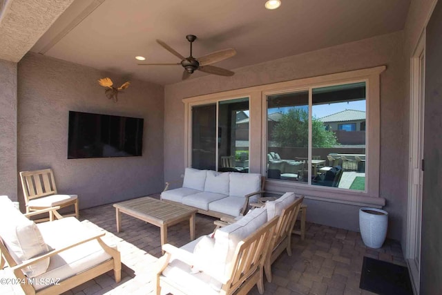 view of patio featuring ceiling fan and outdoor lounge area