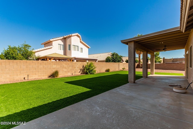 view of yard with a patio and a fenced backyard