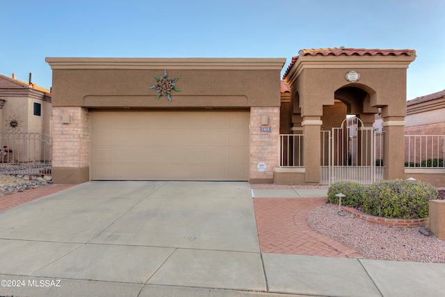 view of front of property featuring a garage