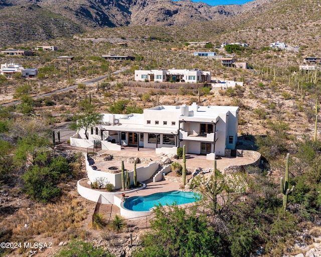 bird's eye view with a mountain view