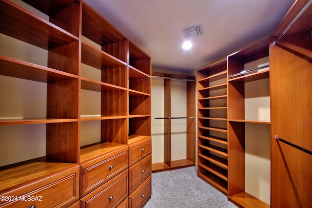 spacious closet with visible vents and carpet flooring