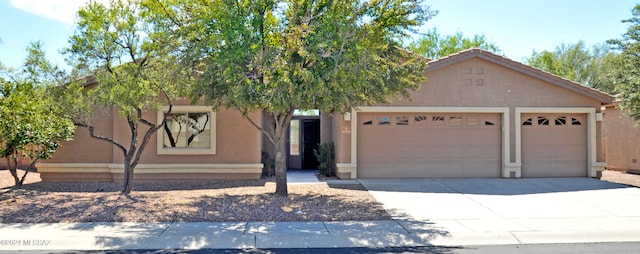 view of front of house with a garage