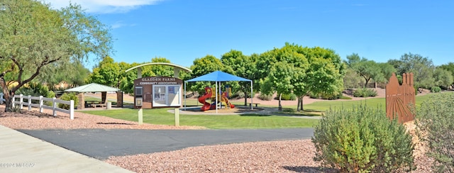 view of play area featuring a gazebo and a lawn