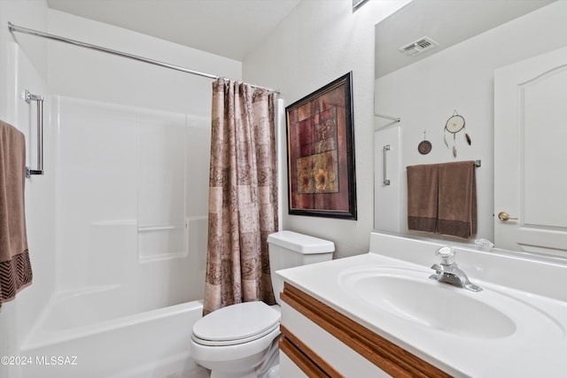 bathroom featuring toilet, shower / tub combo, vanity, and visible vents