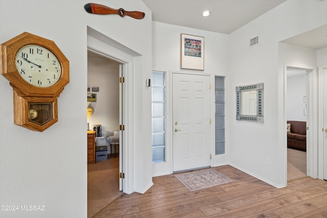 foyer with light hardwood / wood-style flooring