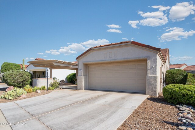 view of front of property with a garage