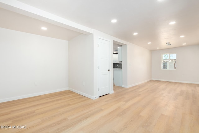 unfurnished room featuring light hardwood / wood-style flooring