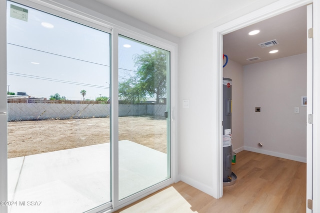 doorway with light hardwood / wood-style floors