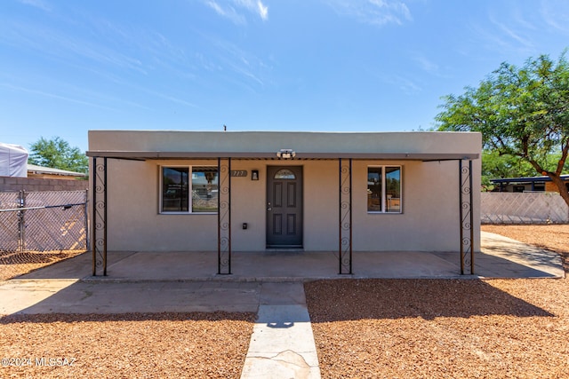 view of front of home featuring a patio area and a porch