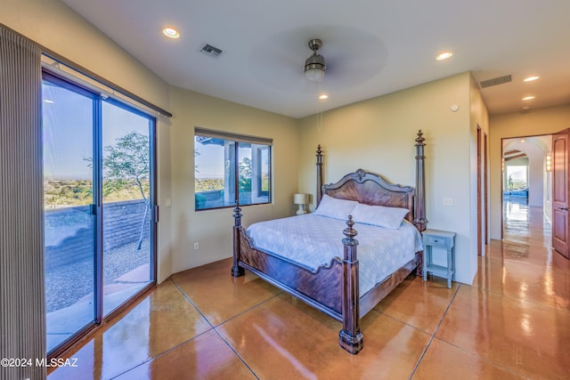 bedroom with access to exterior, multiple windows, and ceiling fan