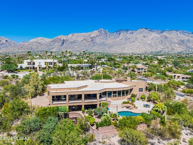 bird's eye view with a mountain view