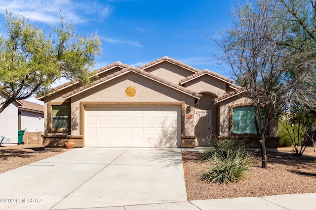 view of front of home with a garage