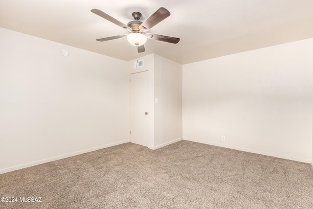 unfurnished room featuring carpet and ceiling fan