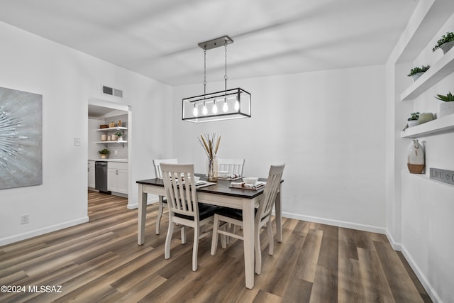 dining room with dark wood-type flooring