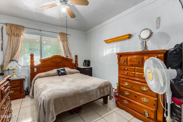 tiled bedroom featuring ceiling fan and ornamental molding