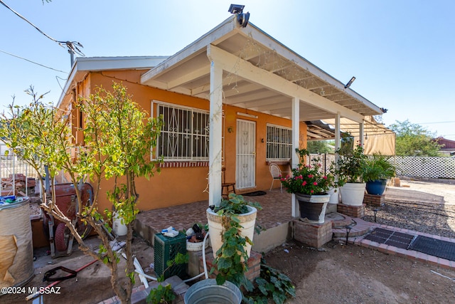 back of house featuring a patio area