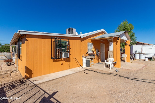 back of house with a patio area