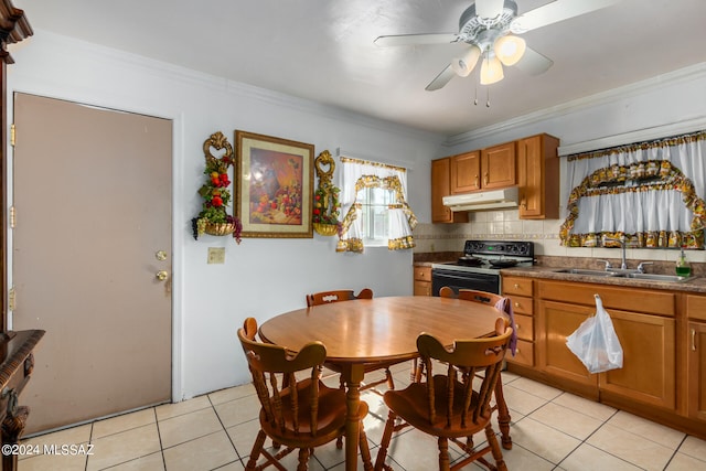 kitchen with ceiling fan, tasteful backsplash, sink, black range with electric cooktop, and ornamental molding